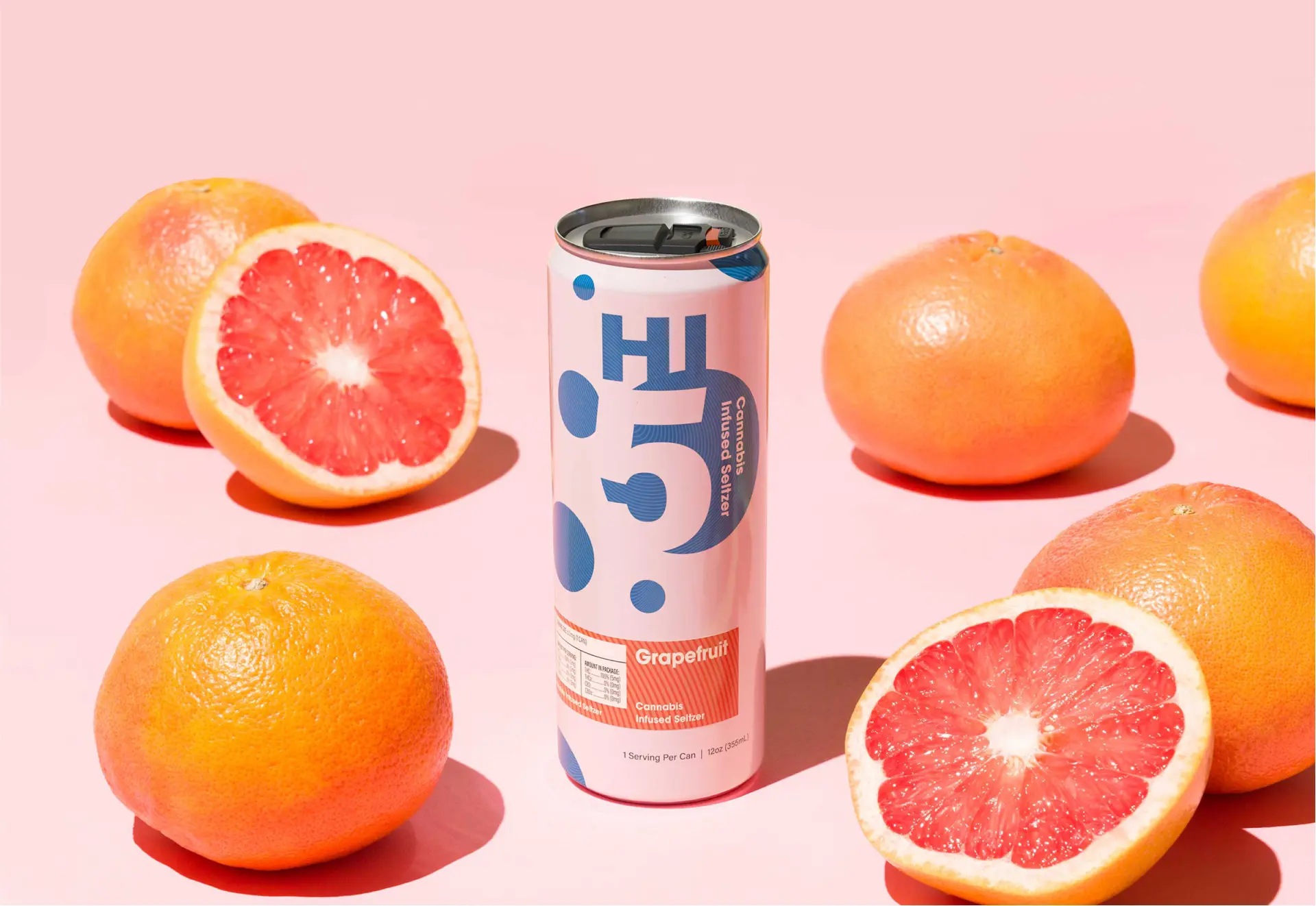 Grapefruit Cannabis Infused Seltzer with sliced grapefruits